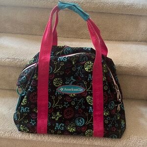 American Girl -kid size duffle bag. Light wear on handles in excellent condition